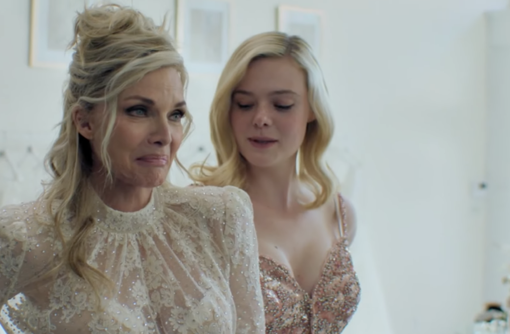 Michelle Pfeiffer as Shyanne in her wedding dress with Elle Fanning as Margo in Margo's Got Money Troubles episode 5